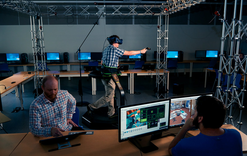 Students working the VR and AR technology in the Game Development Lab.