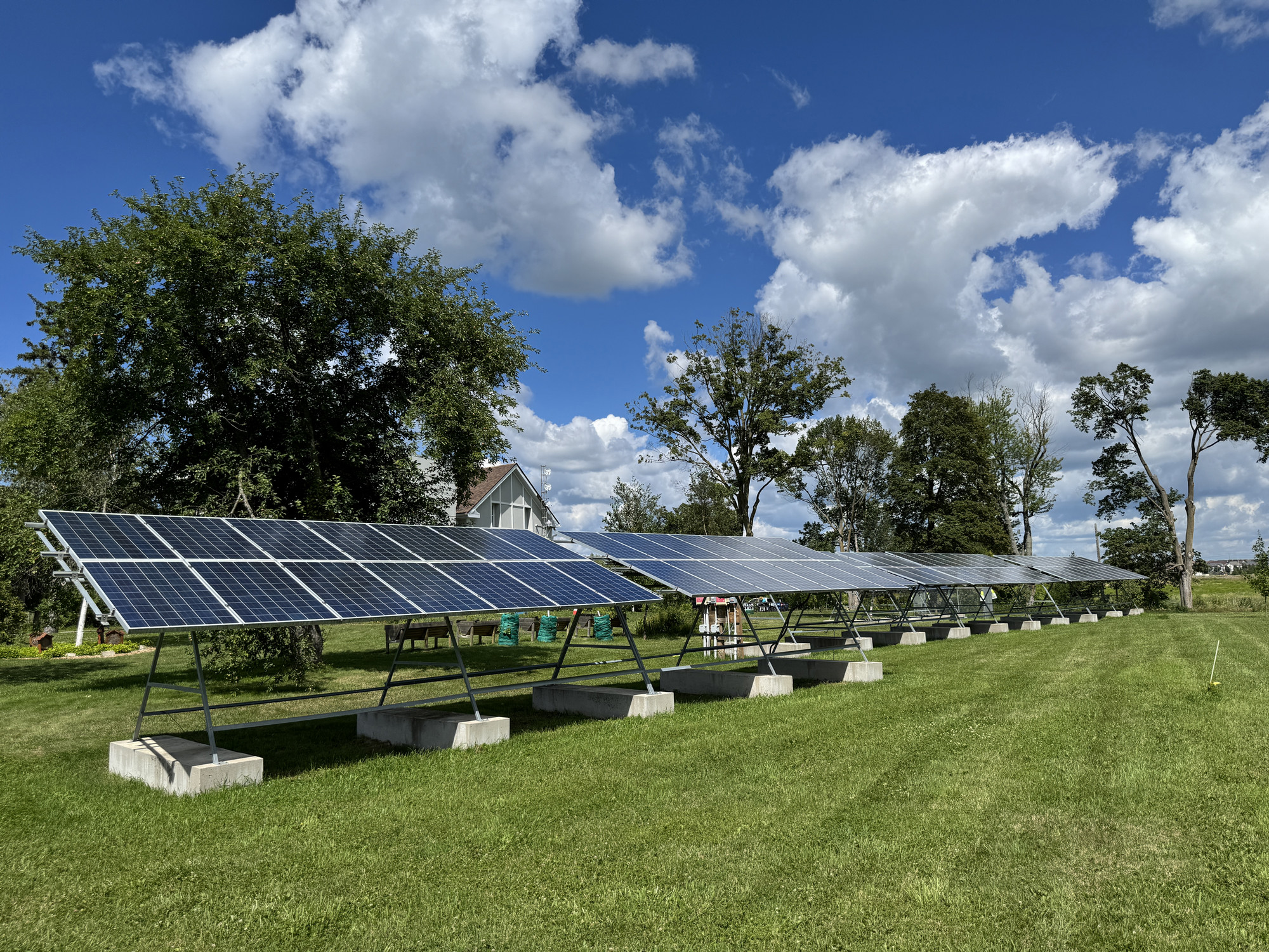 Some of the solar panels installed at the Campus Farm just outside of the Office of Campus Infrastructure and Sustainability.