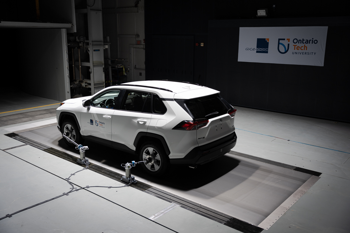 A white Toyota RAV4 on the Moving Ground Plane (MGP) in the Climatic Wind Tunnel (CWT).