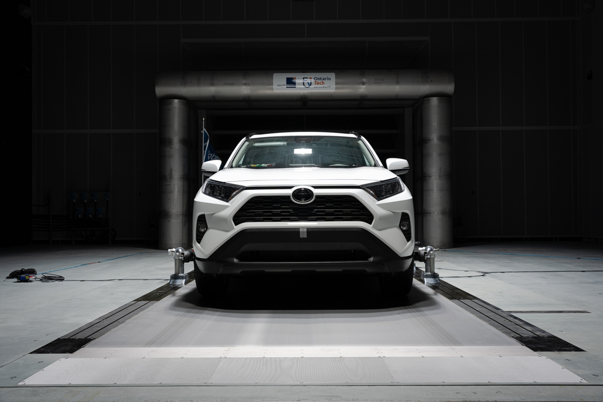 White Toyota RAV4 on the Moving Ground Plane (MGP) in the Climatic Wind Tunnel.