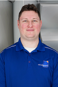 ACE Ontario Tech Research and Development Engineer, Eric Whalls, in branded blue polo