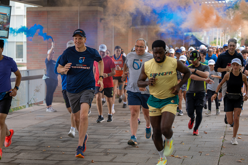 Chancellor Frazer and President and Vice-Chancellor Dr. Steven Murphy join other participants running in the 2024 Chancellor's Challenge 5 KM Run/Walk event.