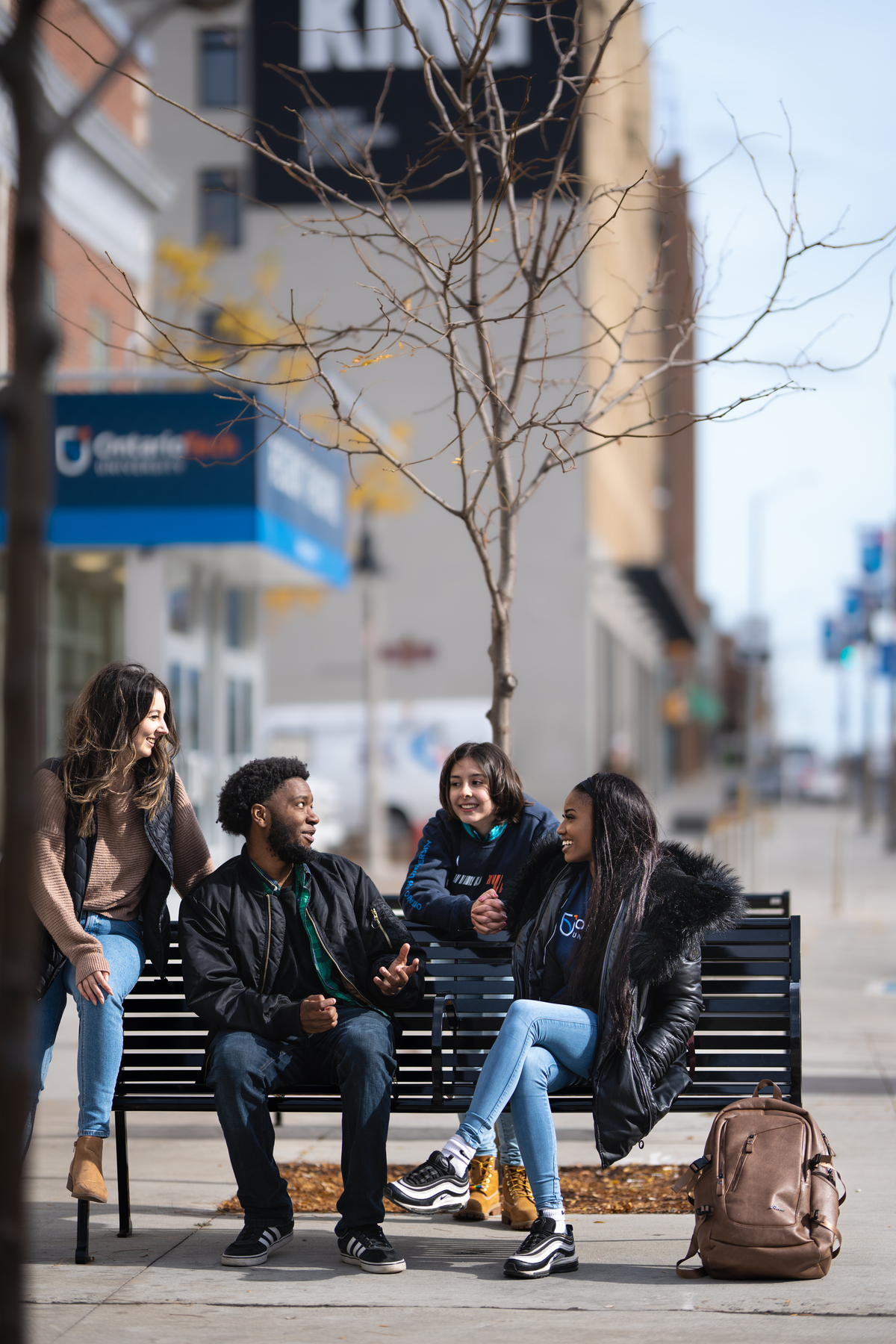Chemistry student writing on a glass wall