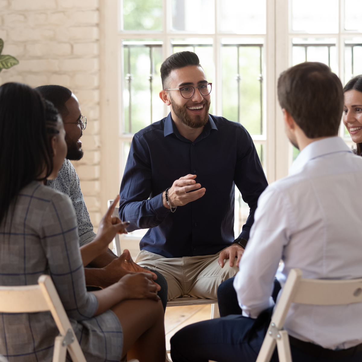 Picture of university alumni being mentored. 