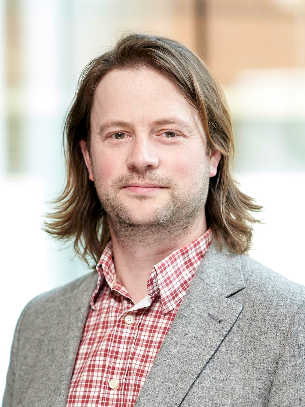 headshot of Dr. Peter Lewis