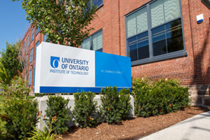 New logo display outside 61 Charles St building