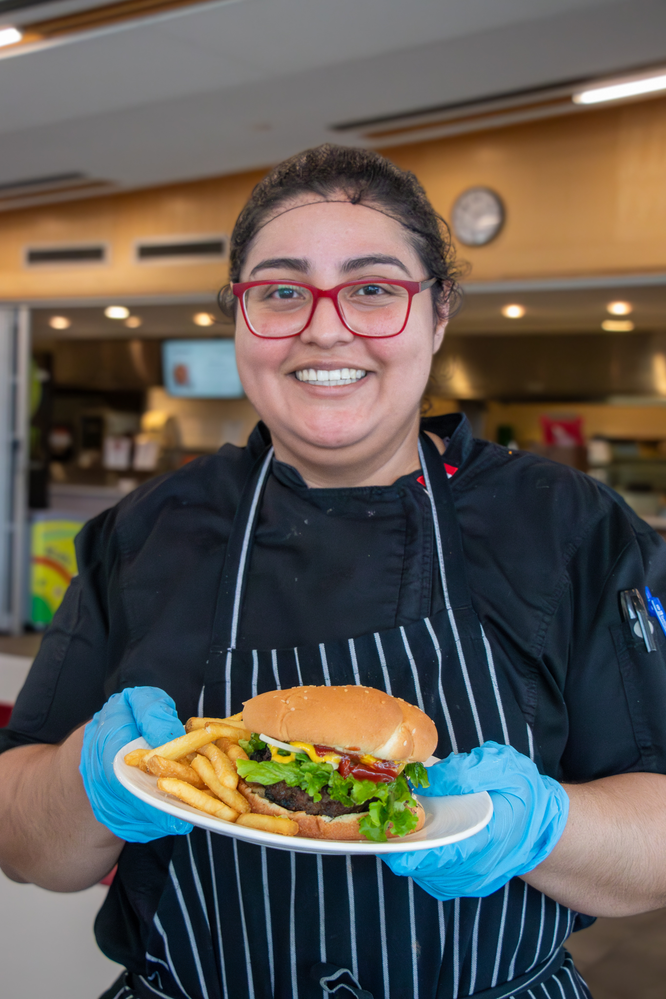 Server with burger.