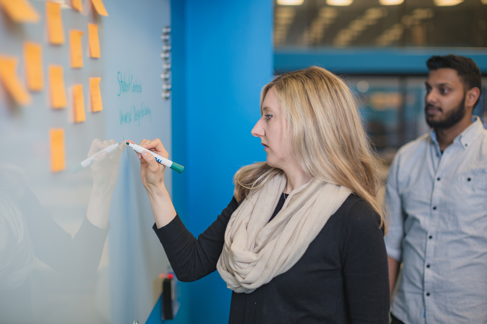 Faculty member teaching a student