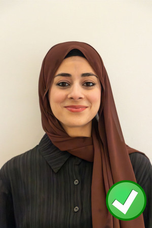 Photo of student directly facing the camera, cropped from above head to chest