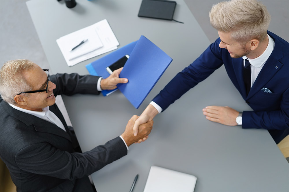 Business people shaking hands