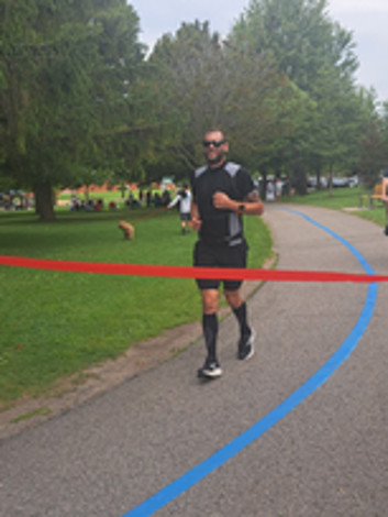 Brent MacRae 3rd place in pastimes category with his marathon run