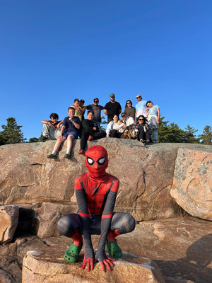 Camille Boate 2nd place in people category with her camp crew and spiderman