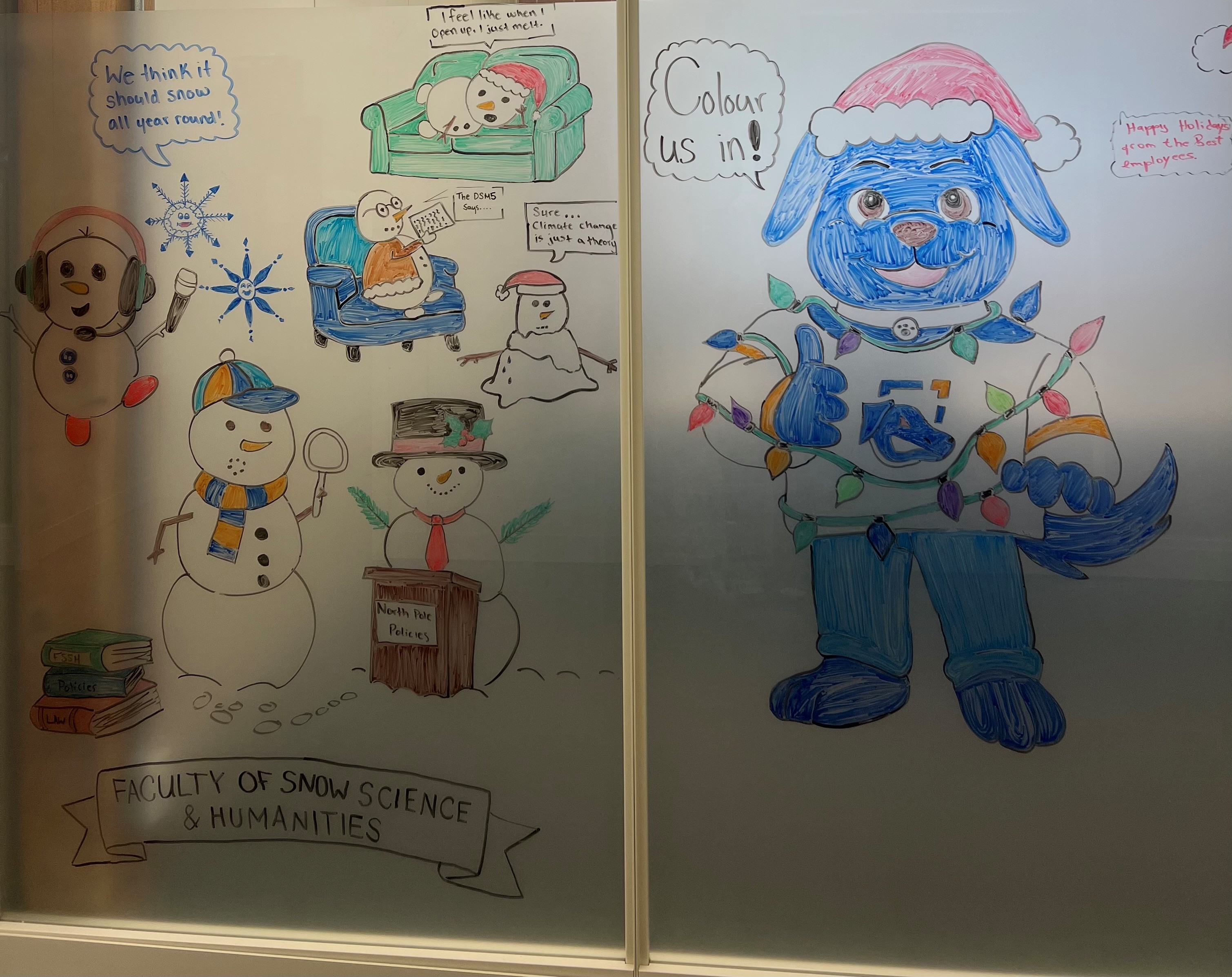 Decorative window with Hunter drawn in a string of lights, and multiple snowman