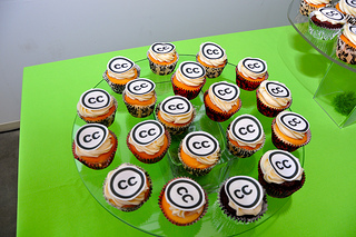 A platter of cupcakes with Creative Commons logo decoration.