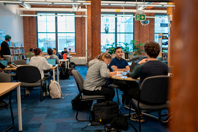 students studying in the library