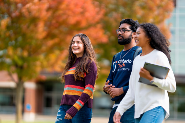 Students walking outside on campus