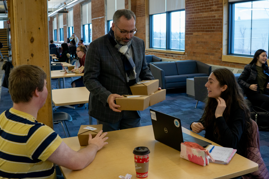 President Steven Murphy joins the 鶹ý Brilliant Catalyst team in delivering exam care packages to students. 