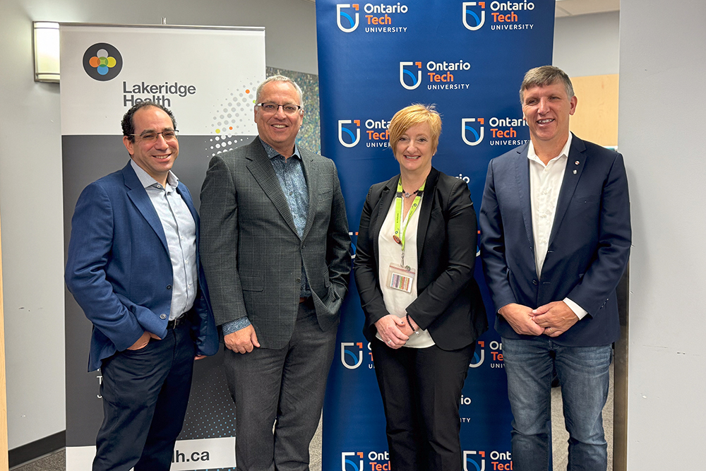 From left: Dr. Ilan Lenga, Chief Information Officer, Lakeridge Health; Dr. Steven Murphy, President and Vice-Chancellor, 鶹ý University; Cynthia Davis, President and Chief Executive Officer, Lakeridge Health; Dr. Les Jacobs, Vice-President, Research and Innovation, 鶹ý University (at Lakeridge Health Oshawa, October 10, 2024).
