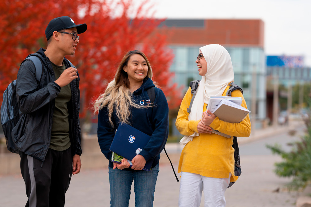 Students talking outside. 