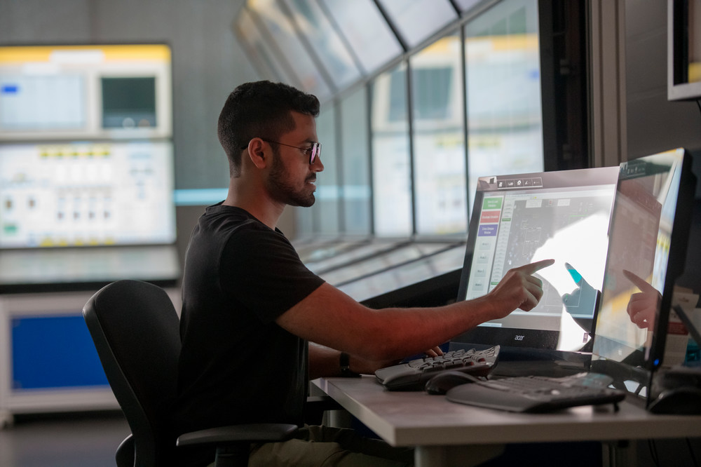 Student at computer. 