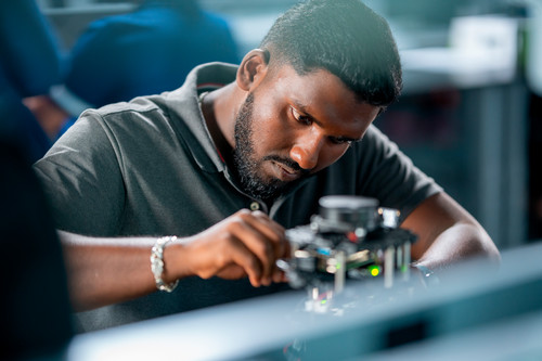 Student working in robotics lab. 