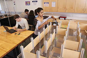 Student working on a structure.