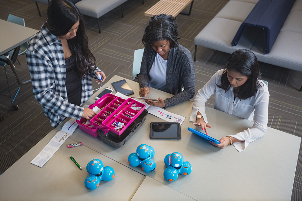 students working with robots