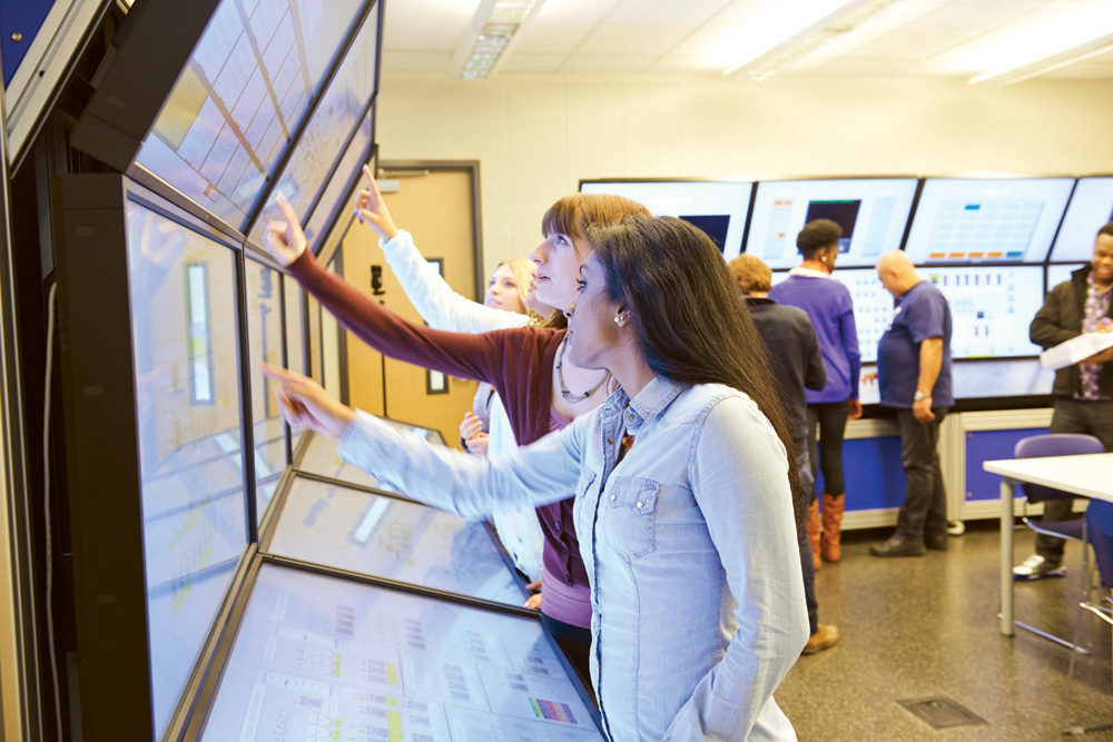 Professor and student examining data