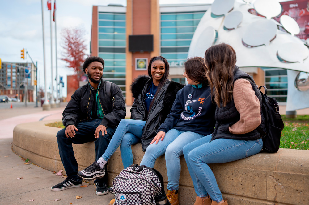 Students sitting outside.