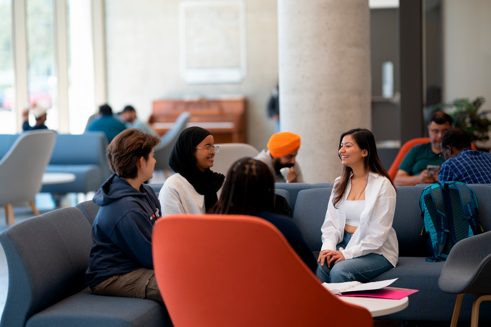 Students sitting in student space