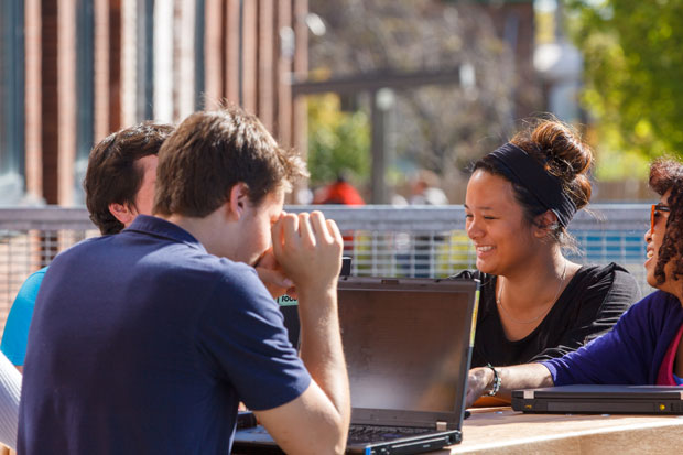 Students sitting outside.