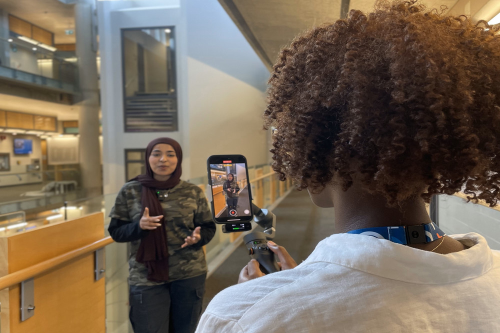 one student filming another student