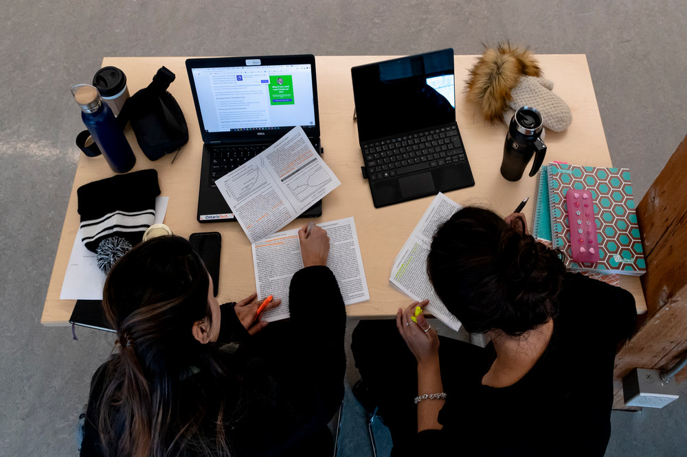 aerial view of students studying at a desk
