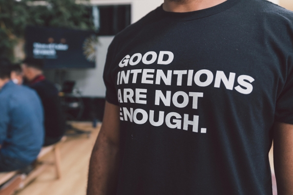 A shirt that says good intentions are not enough 