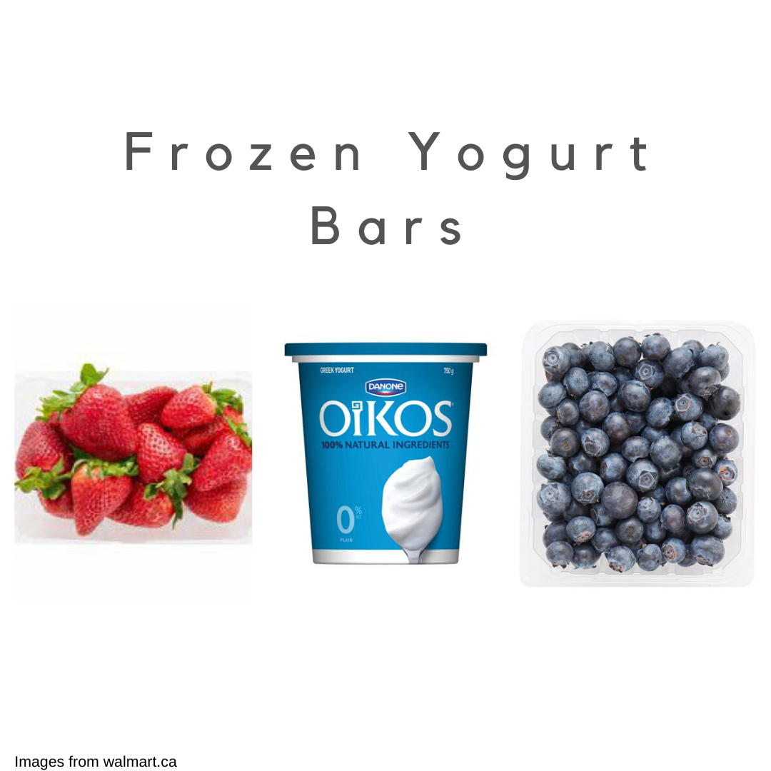 Strawberries, greek yogurt, and blueberries on a white background.