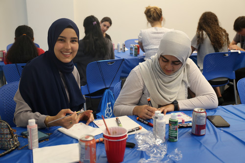 two girls participating in orientation activities