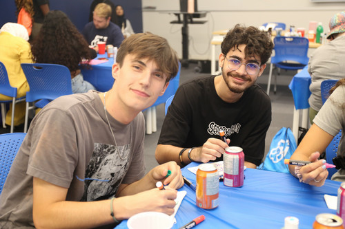 two boys participating in orientation event