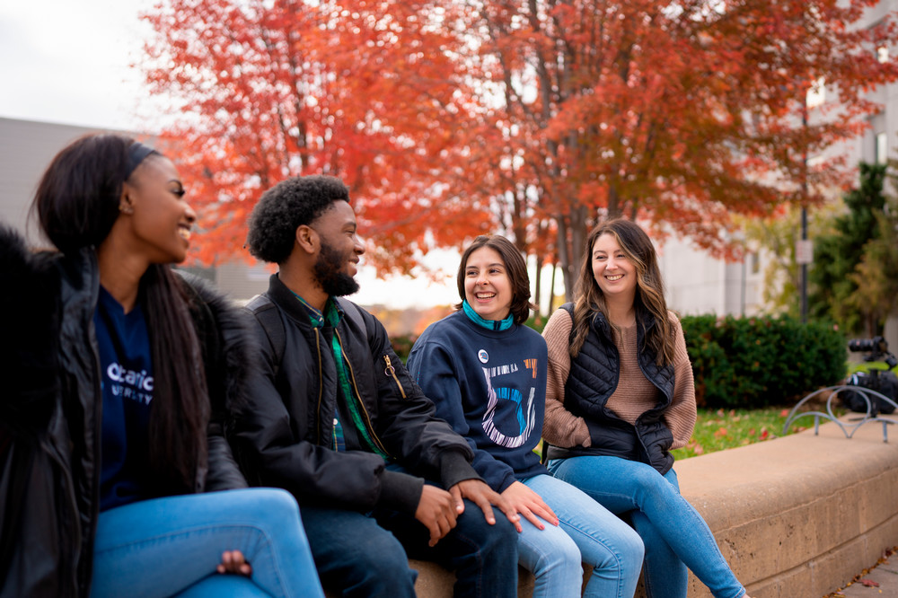 students hanging out on campus