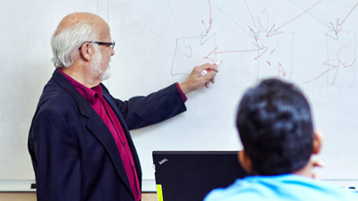Students in a workshop having conversation.