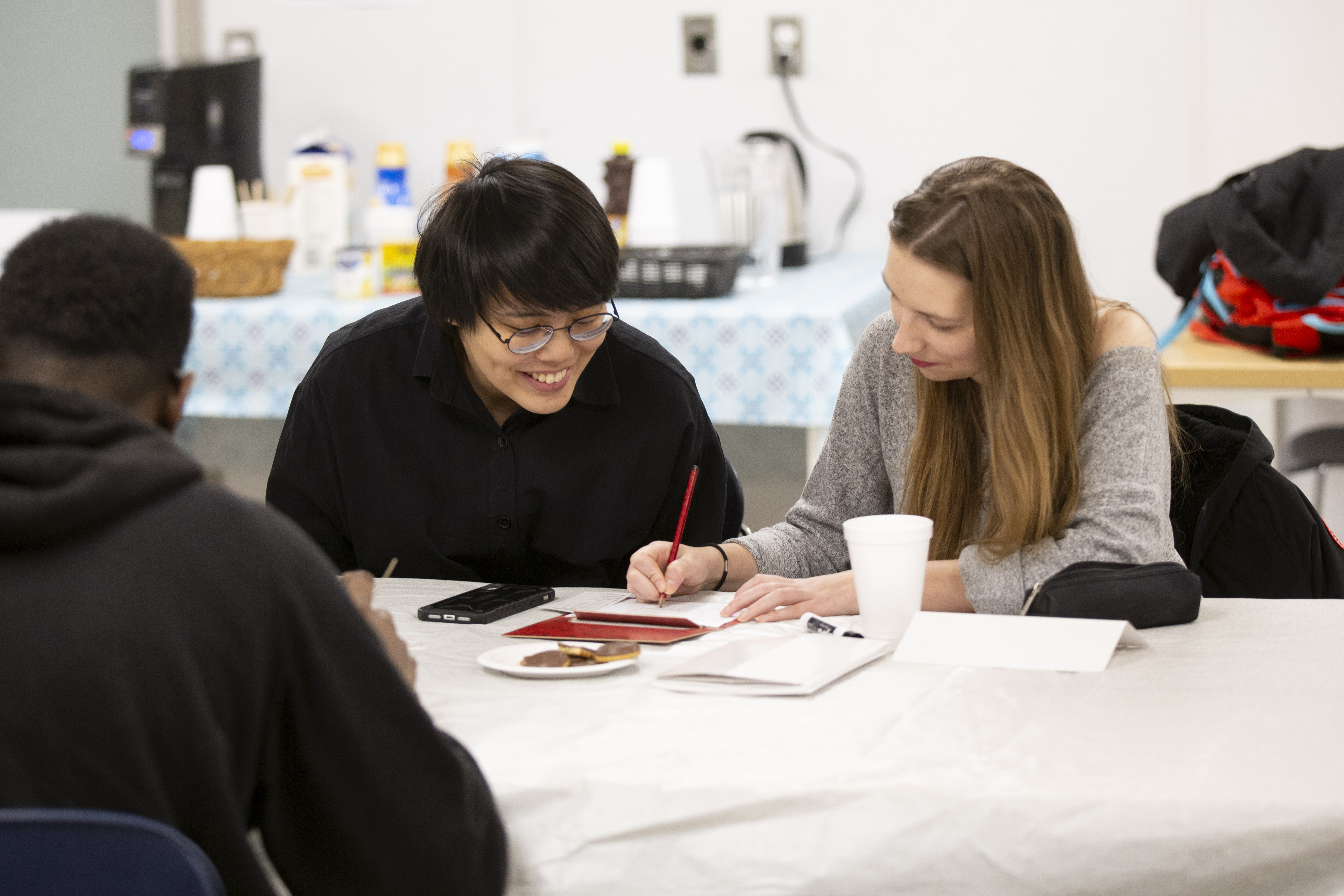 Students at conversation cafe having a discussion