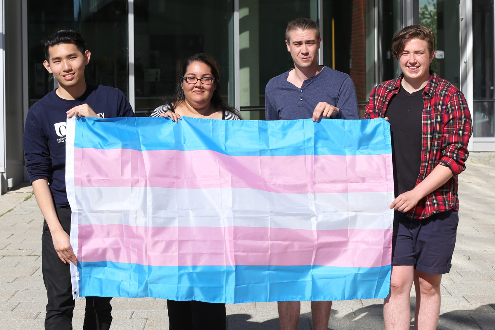 students with trans flag