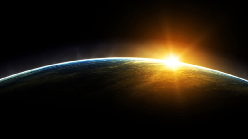 Sunrise over earth from space