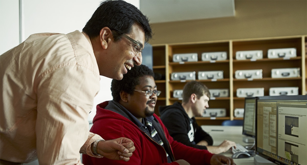 Prof. Faisal Qureshi with computer science students.