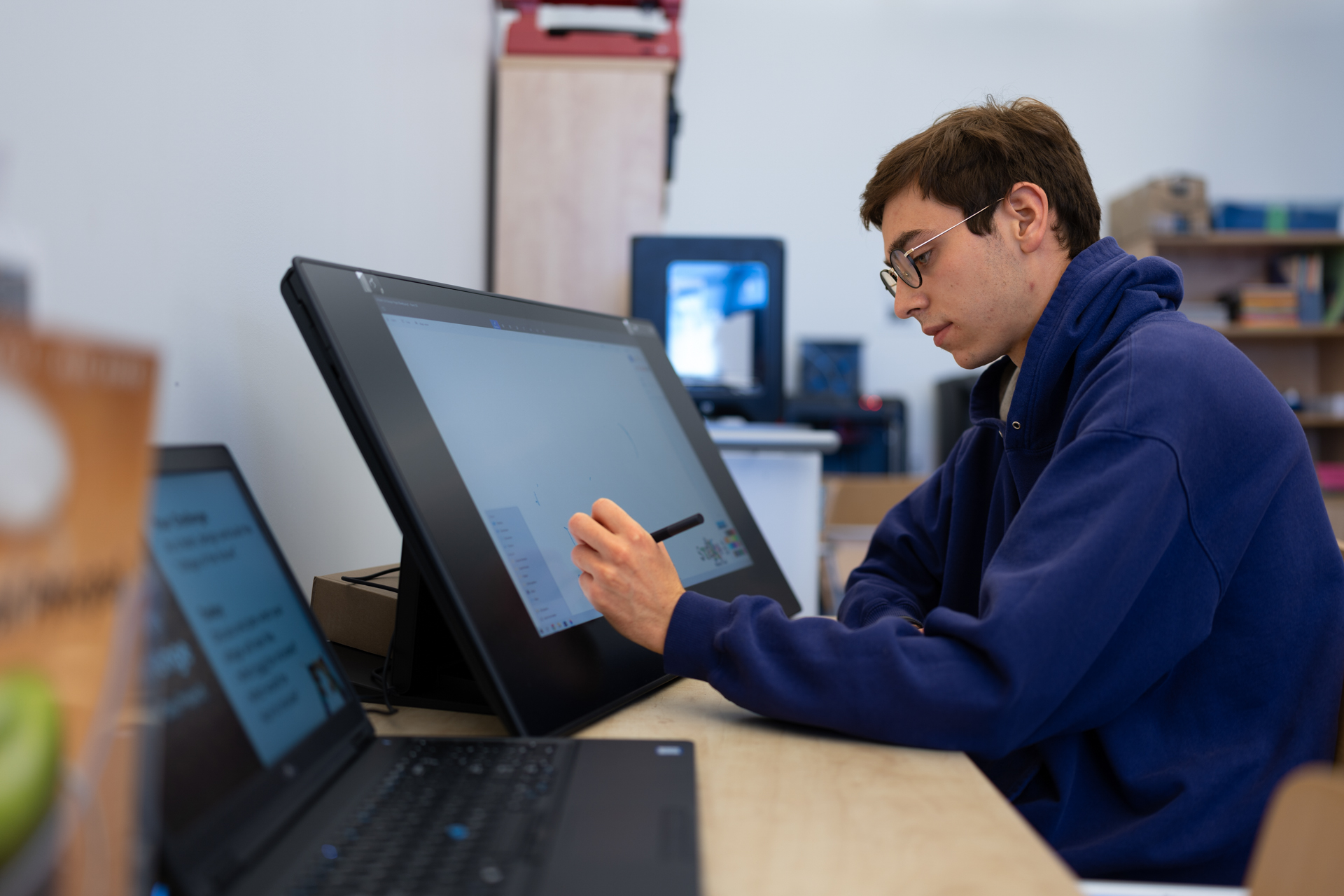 A man's hand using technology