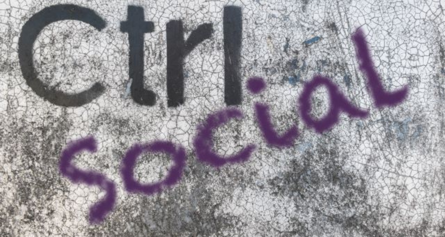 Short form of control on grunge background with "social" in purple.