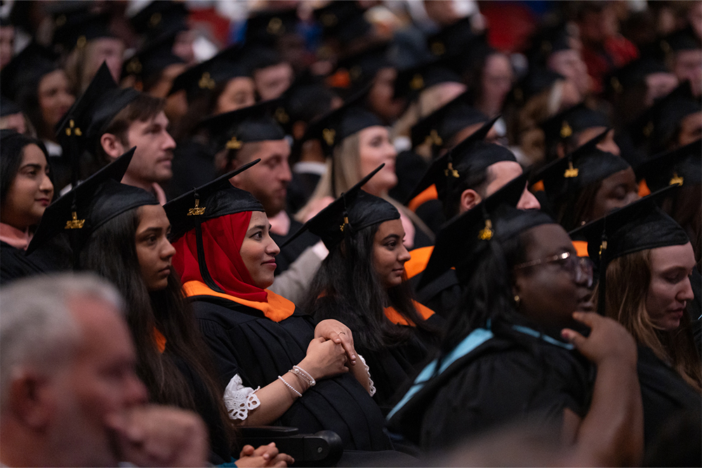 A crowd of graduating students seated at Convocation