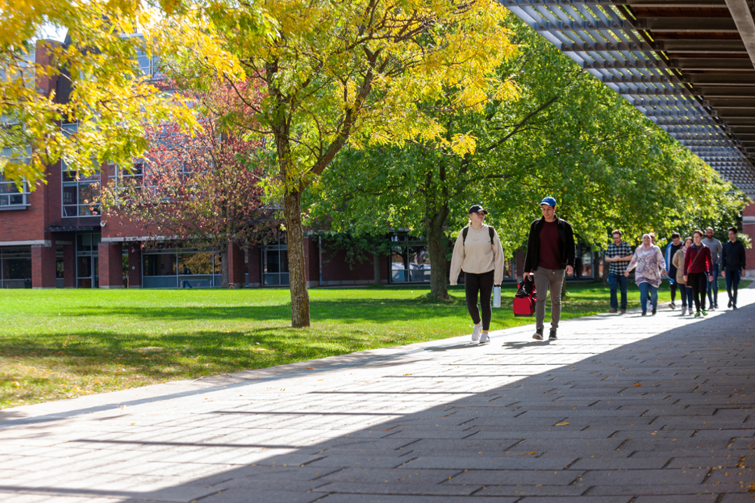 Students walking on Polonsky Commons.